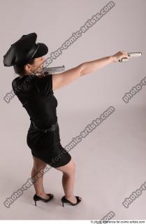 17 NIKITA POLICEWOMAN STANDING POSE WITH TWO GUNS